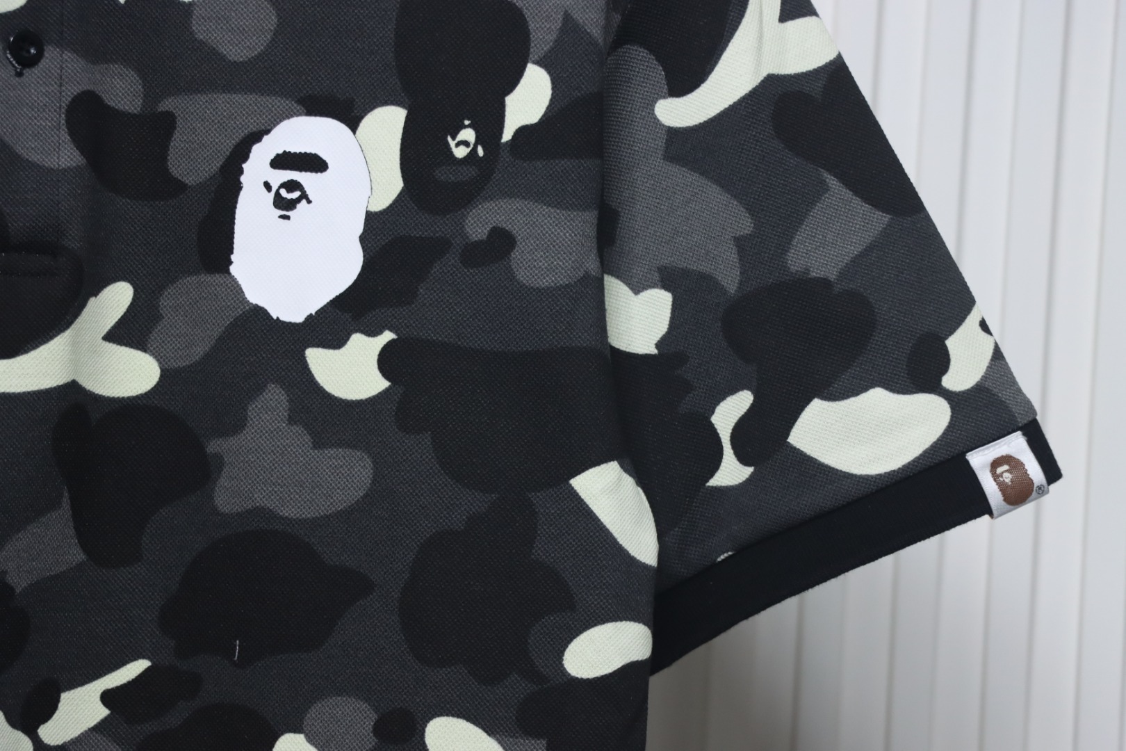 bape_city_camo_large_ape_head_relaxed_fit_polo_black_1CEB880033714.jpg