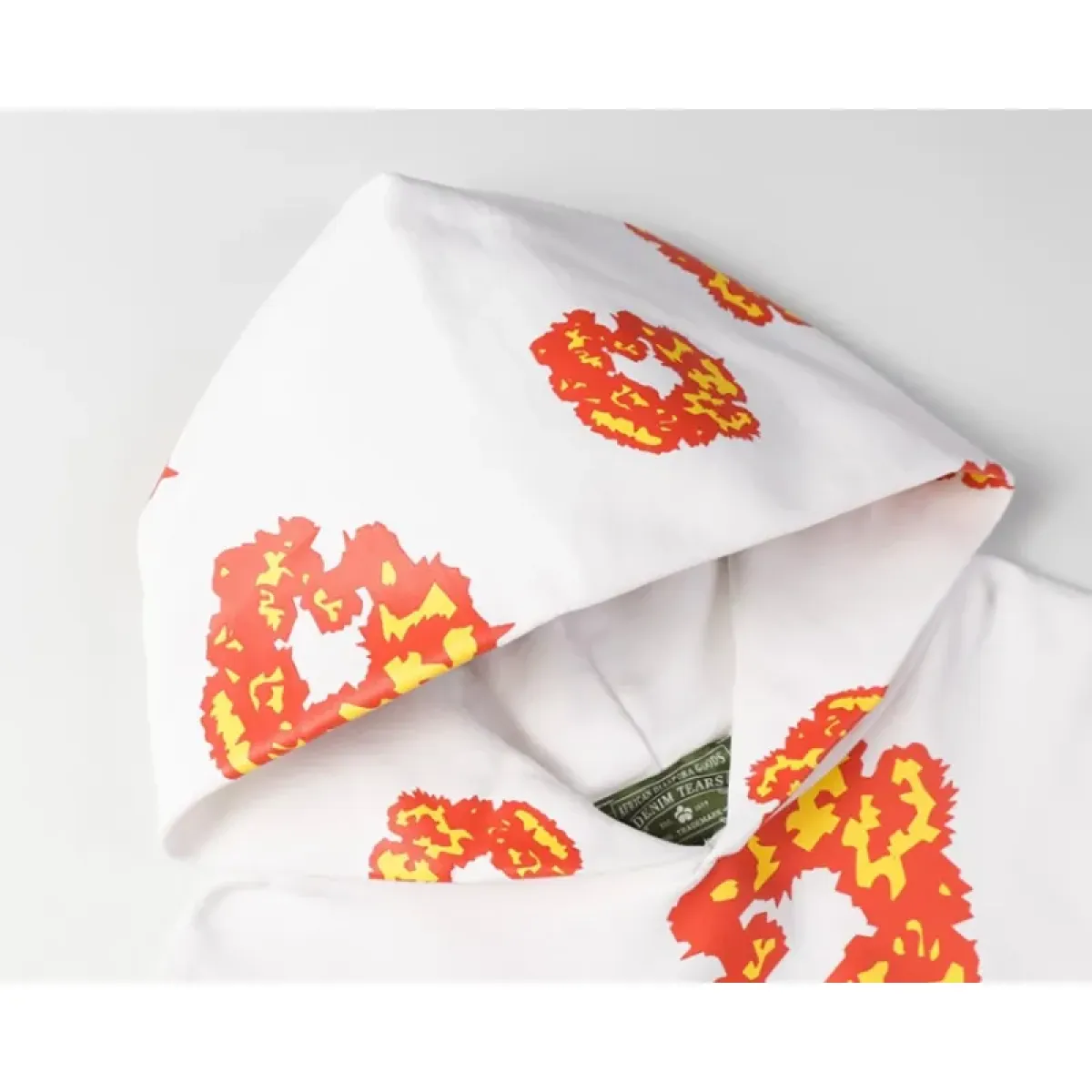 denim_tears_x_offset_wreath_hoodie_white_1B694B92F4515.webp